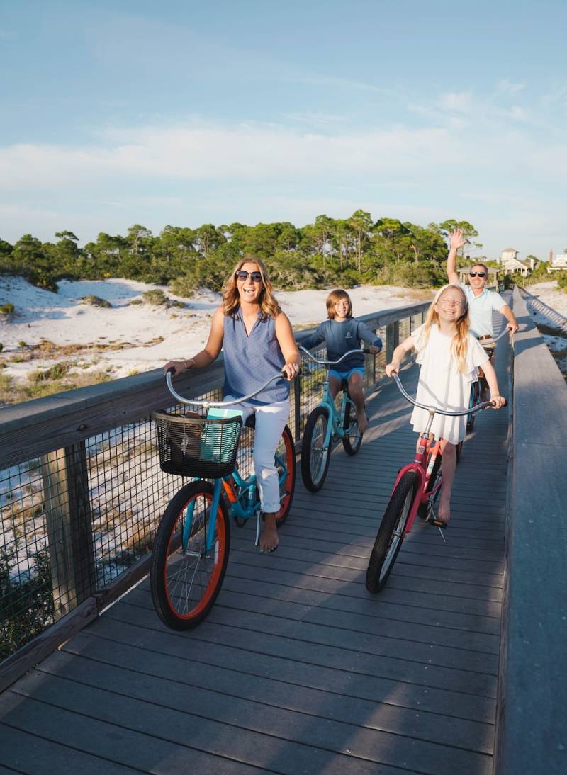 happy family riding bikes